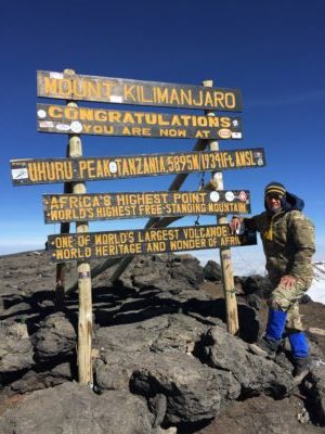 Laurel "Buff" Burkel celebrated her retirement from the Air Force on the summit of Kilimanjaro.