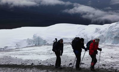 Climbers on Snow covered mountain