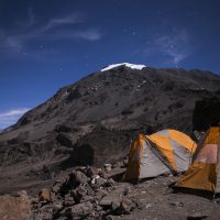 Two tents under the stars on a trek up Mt. Kilimanjaro.