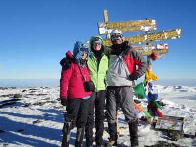 three hikers at summit