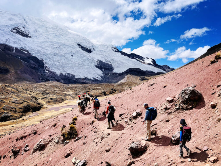 Trekker on mountain path in Peru
